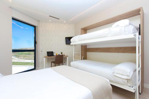 Habitación Cuádruple del hotel Ciudad De Burgos. Foto 4