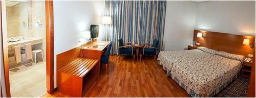 Habitación Doble con cama supletoria - 1 o 2 camas del hotel Extremadura