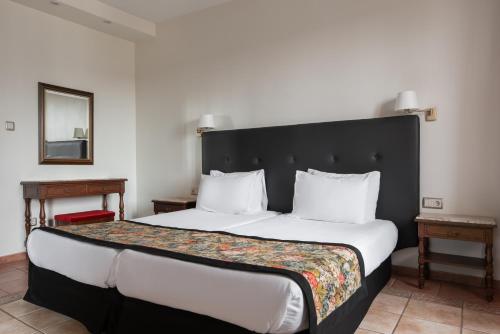 Habitación Doble con cama supletoria y aparcamiento del hotel Dorma Alfonso VIII. Foto 5