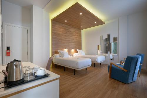Habitación Doble Superior - 1 o 2 camas del hotel Monte Puertatierra. Foto 1
