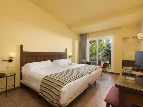 Habitación Triple Clásica del hotel Fuerte Grazalema. Foto 1