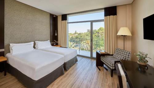 Habitación Doble Estándar con terraza - 1 cama doble o 2 camas individuales del hotel Nh Avenida Jerez