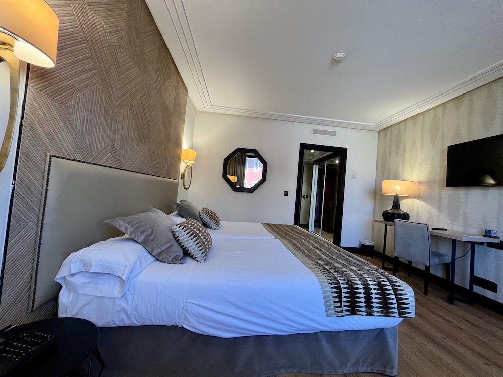 Habitación con 2 camas individuales del hotel Bahia. Foto 4