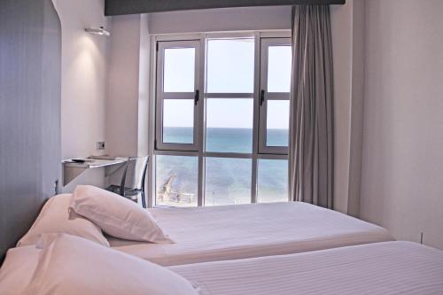 Habitación Doble con vistas al mar del hotel Chiqui