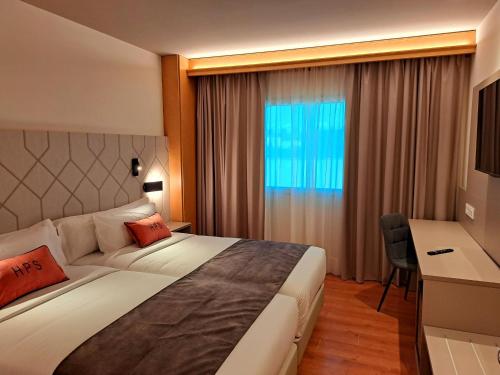 Habitación Doble Estándar del hotel Puerta Santander. Foto 2
