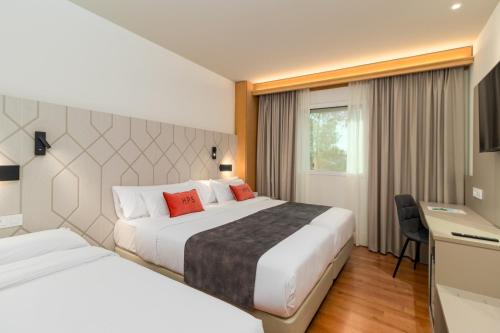 Habitación Doble con cama supletoria - 1 o 2 camas del hotel Puerta Santander. Foto 8