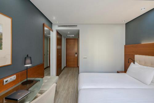 Habitación Doble Deluxe - 1 o 2 camas del hotel Dorma Coliseum. Foto 2