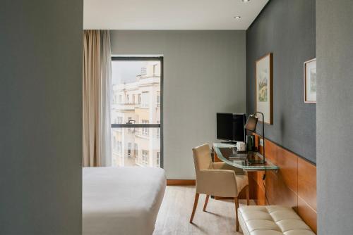 Habitación Doble Deluxe con vistas a la ciudad - 1 o 2 camas del hotel Dorma Coliseum