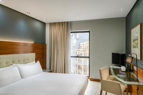 Habitación Doble Deluxe con vistas a la ciudad - 1 o 2 camas del hotel Dorma Coliseum. Foto 2