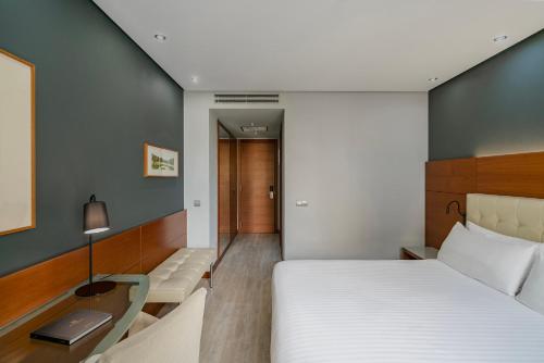 Habitación Doble Deluxe con vistas a la ciudad - 1 o 2 camas del hotel Dorma Coliseum. Foto 4