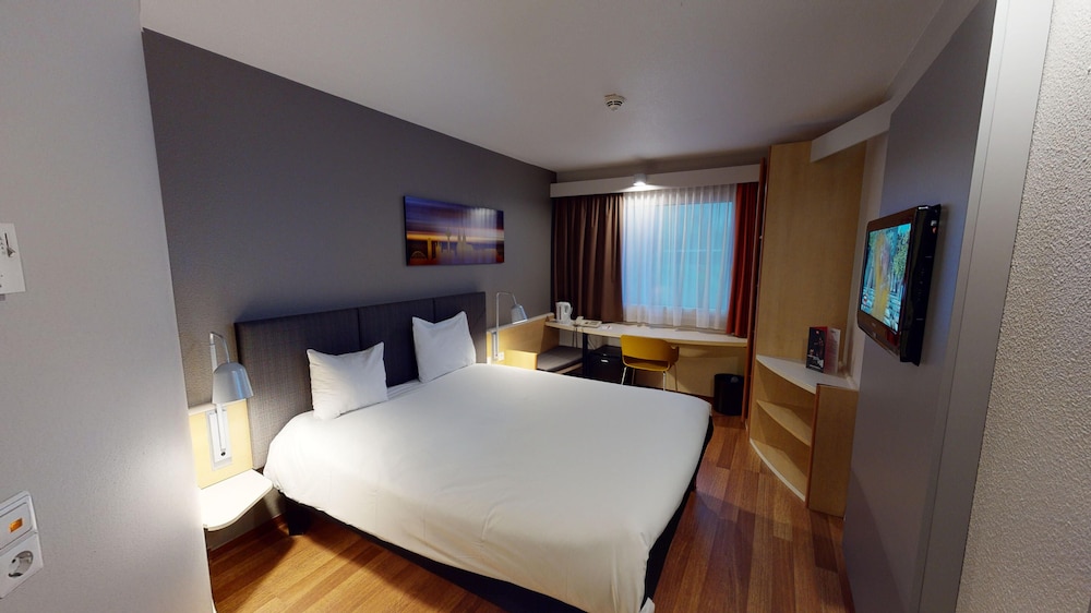 Habitación con 1 cama doble (160 x 200 cm), nuevo concepto sleep - easy del hotel Ibis Köln Airport. Foto 1