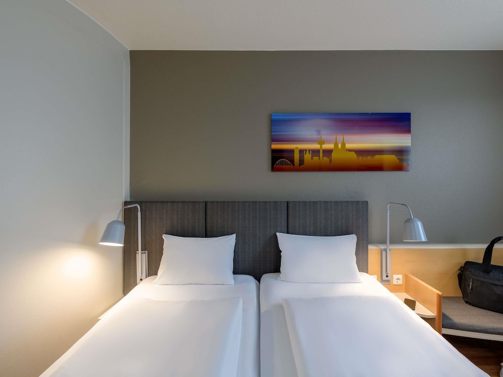 Habitación con camas individuales, nuevo concepto sleep - easy del hotel Ibis Köln Airport
