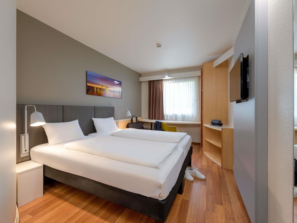 Habitación con camas individuales, nuevo concepto sleep - easy del hotel Ibis Köln Airport. Foto 14