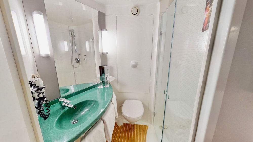 Habitación con camas individuales, nuevo concepto sleep - easy del hotel Ibis Köln Airport. Foto 15