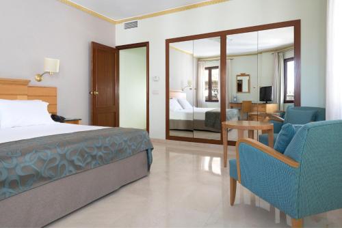 Habitación Doble con cama supletoria del hotel Eurostars Maimonides. Foto 3