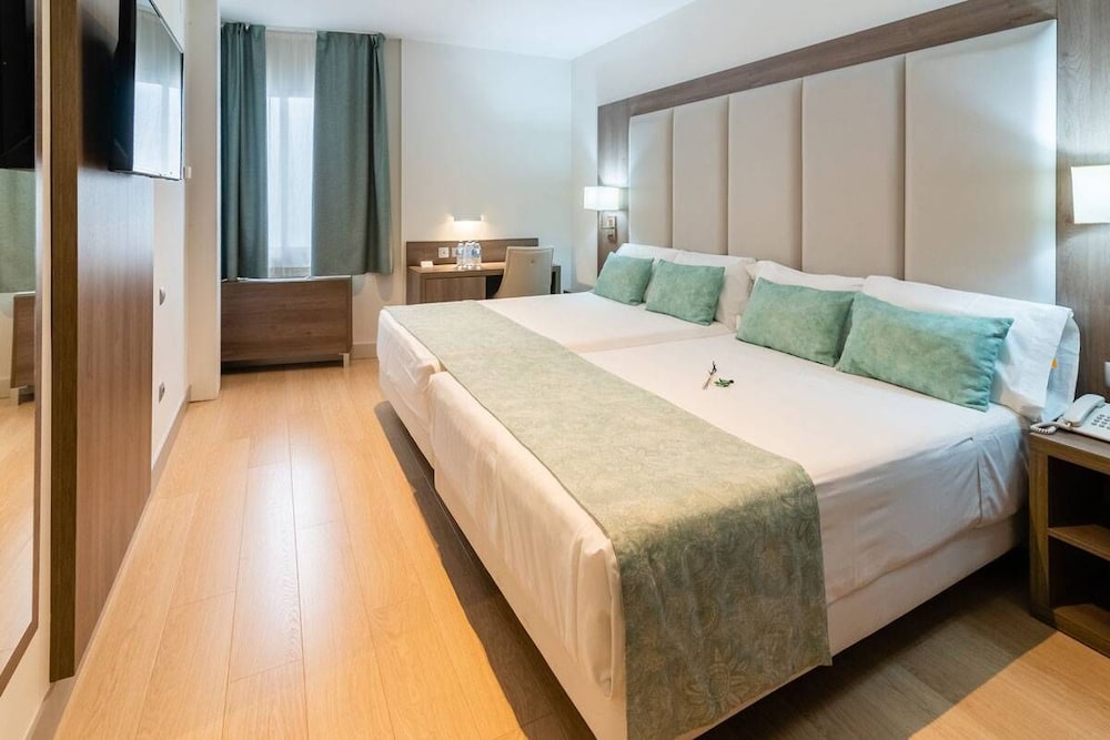 Habitación familiar del hotel Selu