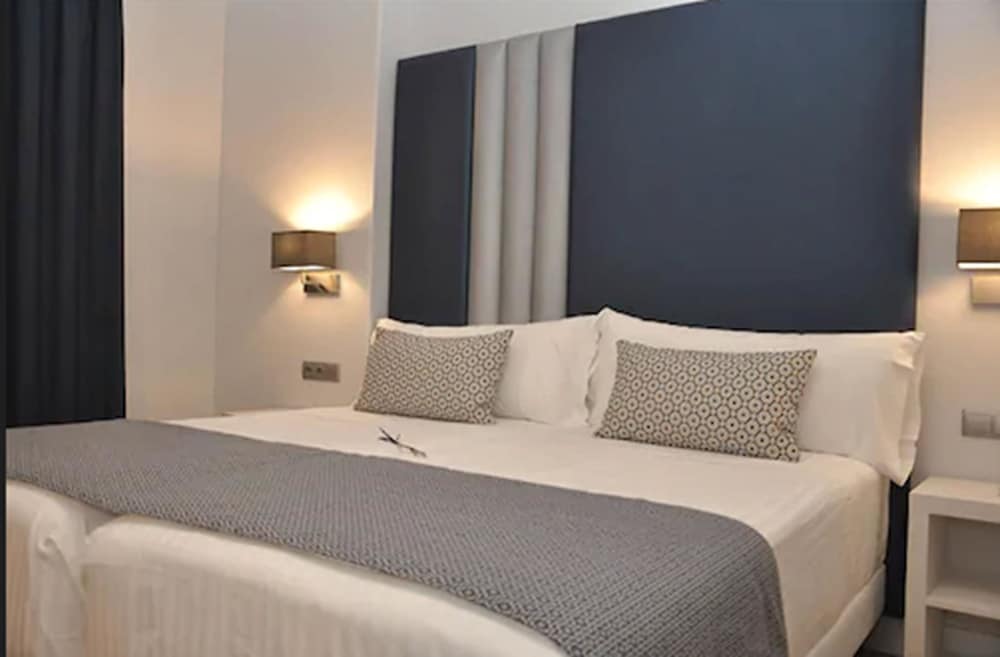 Habitación estándar con 2 camas individuales del hotel Selu. Foto 12