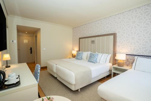 Habitación Superior con cama supletoria del hotel Hesperia Córdoba. Foto 5