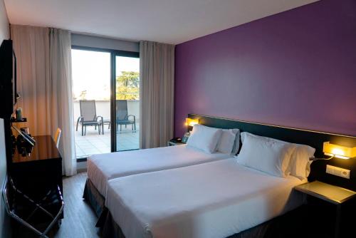 Habitación Doble Superior con terraza - 2 camas individuales del hotel Sercotel Córdoba Medina Azahara
