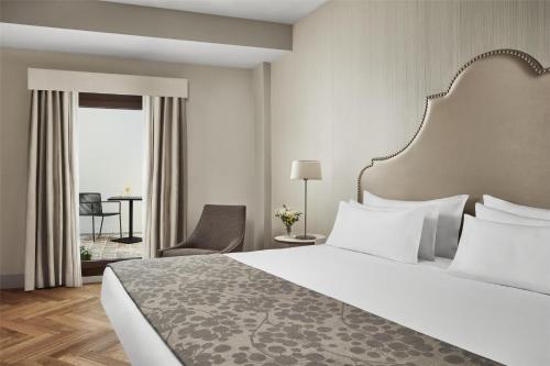 Habitación Premium con patio del hotel NH Collection Palacio de Córdoba. Foto 4