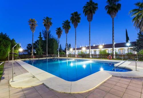 Habitación Doble con vistas a la piscina del hotel Exe Las Adelfas. Foto 4