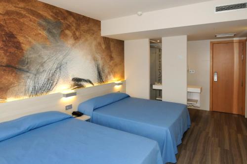 Habitación Triple del hotel Riviera. Foto 4