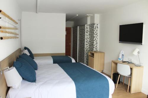 Habitación Triple de diseño del hotel Aqua Onabrava and Spa. Foto 6