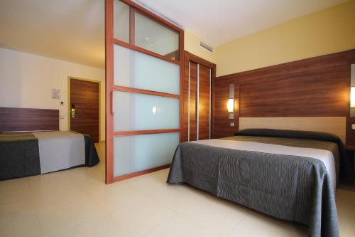 Habitación Familiar del hotel Aqua Aquamarina. Foto 5