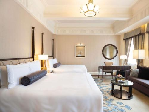 Deluxe Twin Room - First Round Minibar Soft Drink del hotel Fairmont Peace. Foto 2