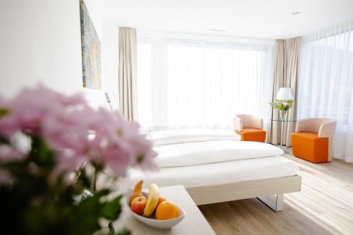 Habitación Superior Esquina con 2 camas individuales, vistas a la montaña del hotel Mercure Chur City West. Foto 5