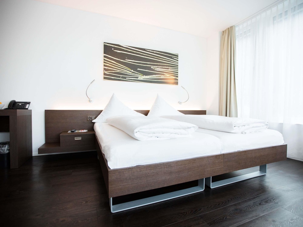 Habitación Comfort con 2 camas individuales del hotel Mercure Chur City West. Foto 2