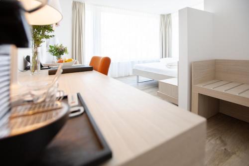 Habitación Superior Esquina con 1 cama doble, vistas a la montaña del hotel Mercure Chur City West. Foto 4