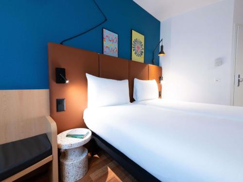 Habitación Estándar - 2 camas individuales del hotel Ibis Geneve Centre Nations. Foto 7