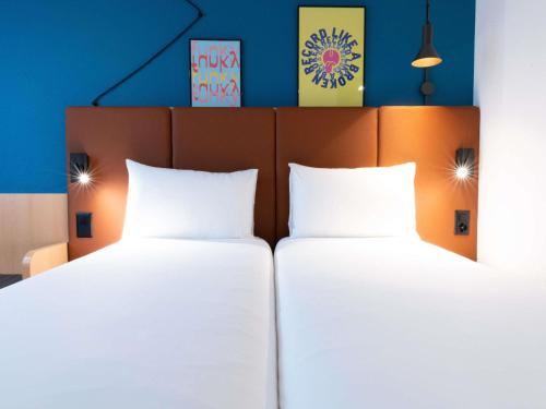 Habitación Estándar - 2 camas individuales del hotel Ibis Geneve Centre Nations. Foto 8