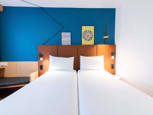 Habitación Estándar - 2 camas individuales del hotel Ibis Geneve Centre Nations. Foto 9