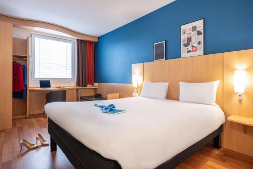 Habitación Estándar - 2 camas individuales del hotel Ibis Geneve Centre Nations. Foto 11