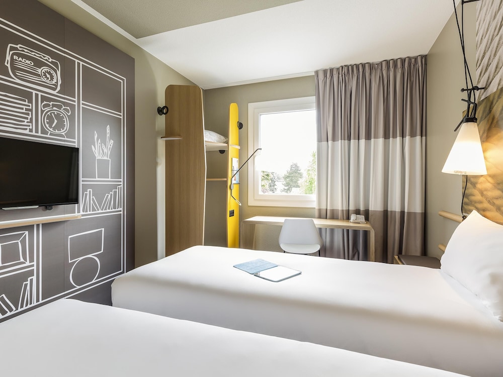 Habitación Standard con 2 camas individuales del hotel Ibis Geneve Aeroport. Foto 3