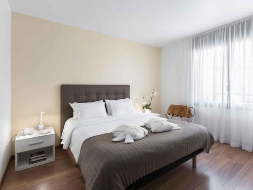 Suite Junior con 1 cama doble del hotel Ibis Locarno. Foto 3