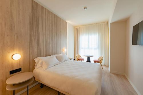 Habitación con vistas al jardín del hotel RH Silene & Spa. Foto 1