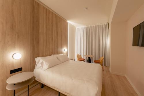 Habitación con vistas al jardín del hotel RH Silene & Spa. Foto 5