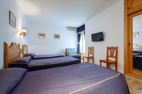 Habitación Triple del hotel Philadelfia