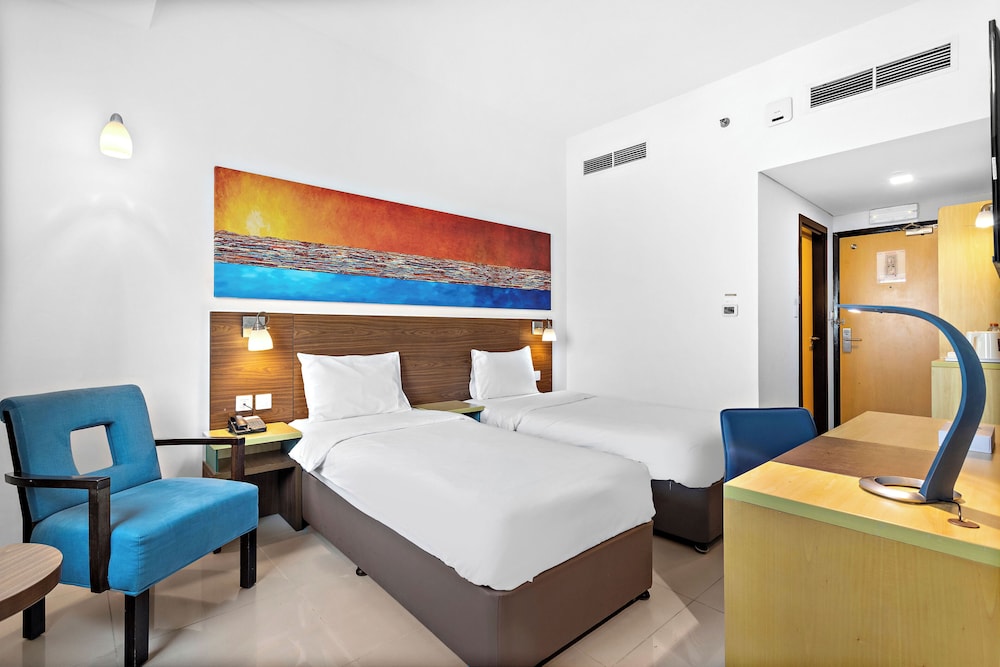 Habitación con 2 camas individuales del hotel Citymax Bur Dubai. Foto 2