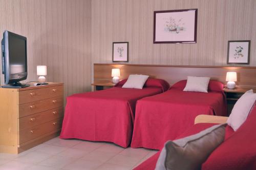 Habitación Triple del hotel Residence Ulivi E Palme