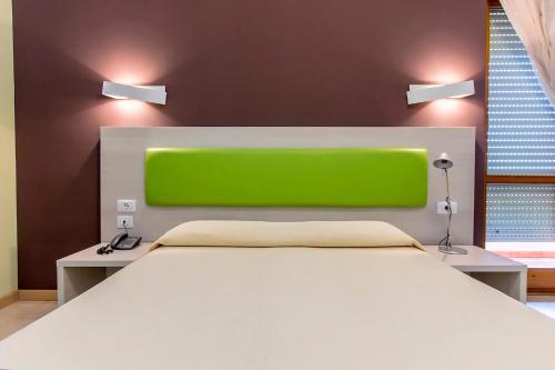 Habitación Triple Superior del hotel Residence Ulivi E Palme