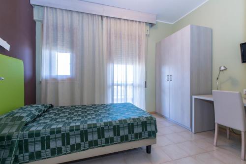 Suite Superior de 2 dormitorios del hotel Residence Ulivi E Palme. Foto 3