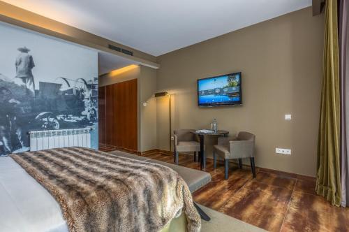Habitación Deluxe del hotel AP Lago Montargil Conference & Spa. Foto 3