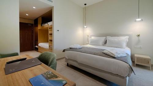 Habitación Familiar del hotel AP Lago Montargil Conference & Spa. Foto 14