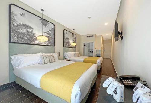 Habitación Familiar del hotel Soho Boutique Puerto. Foto 1