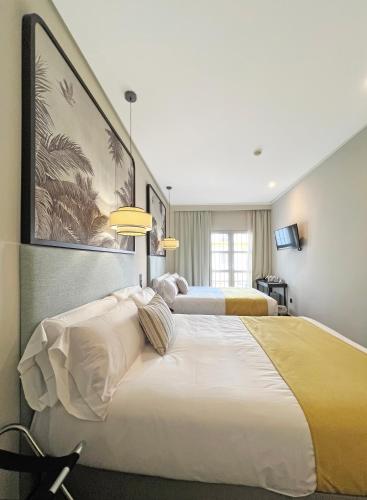 Habitación Familiar del hotel Soho Boutique Puerto. Foto 2