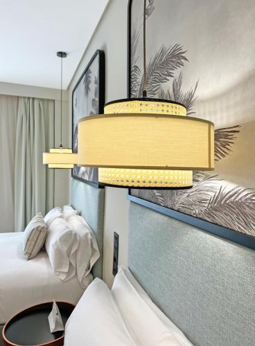 Habitación Triple del hotel Soho Boutique Puerto. Foto 4